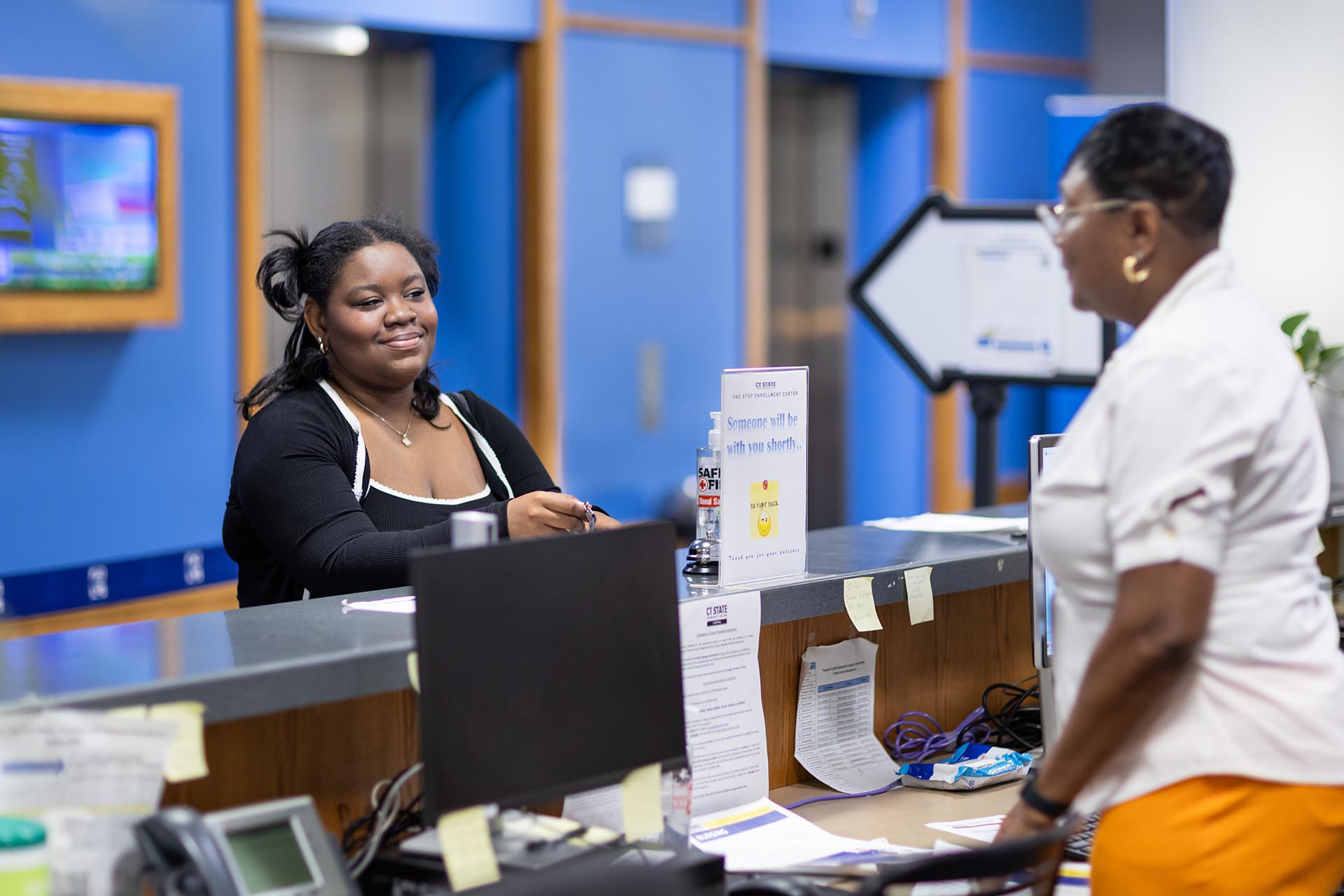 A student is registering for classes at CT State Capital.