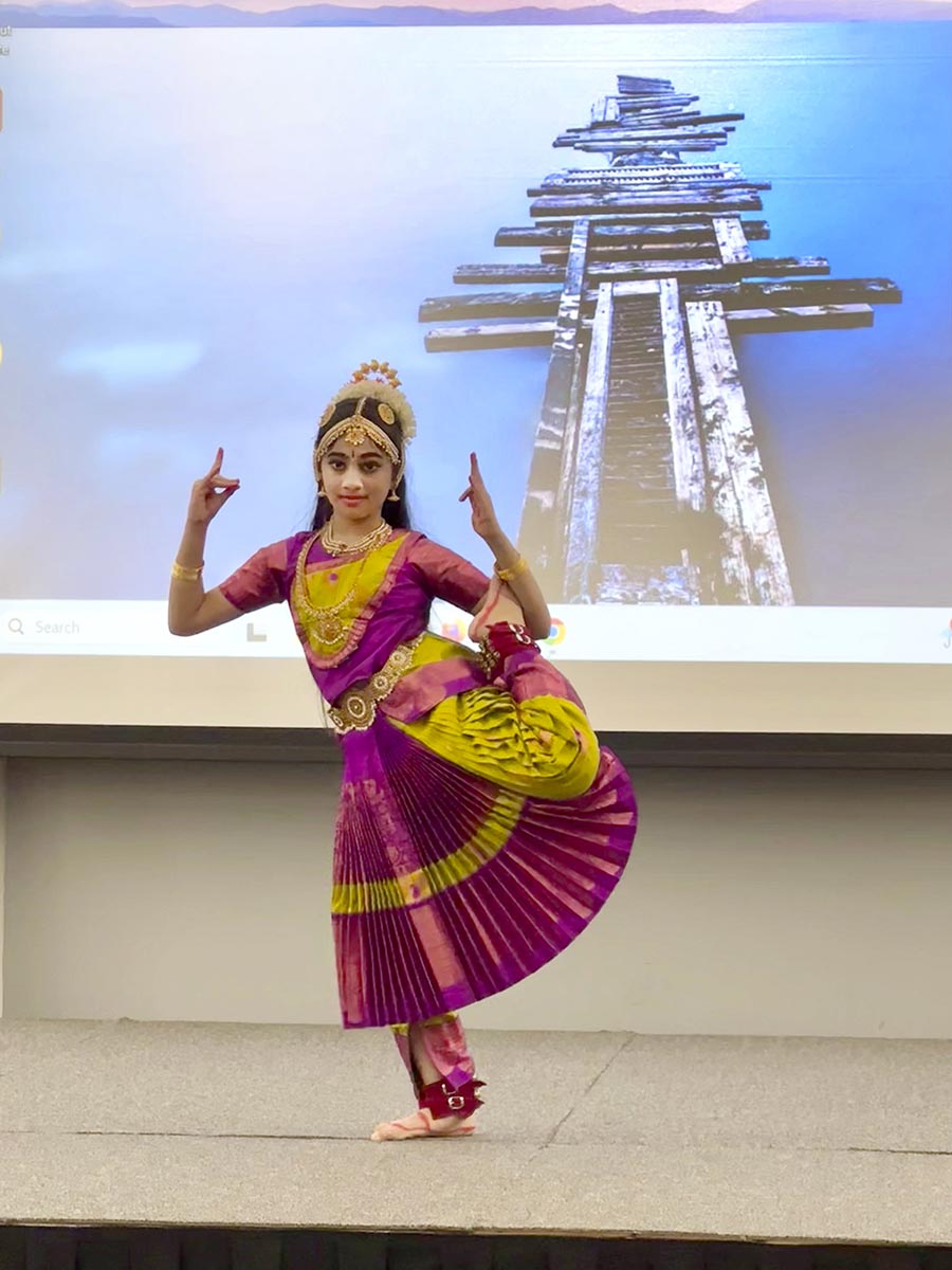 A dancer performs on stage