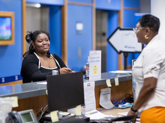 A student is registering for classes at CT State Capital.