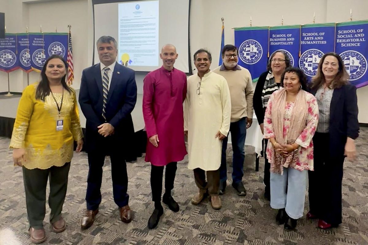 Students and faculty celebrate Diwali with colorful lights and traditional attire at CT State Community College, 2025