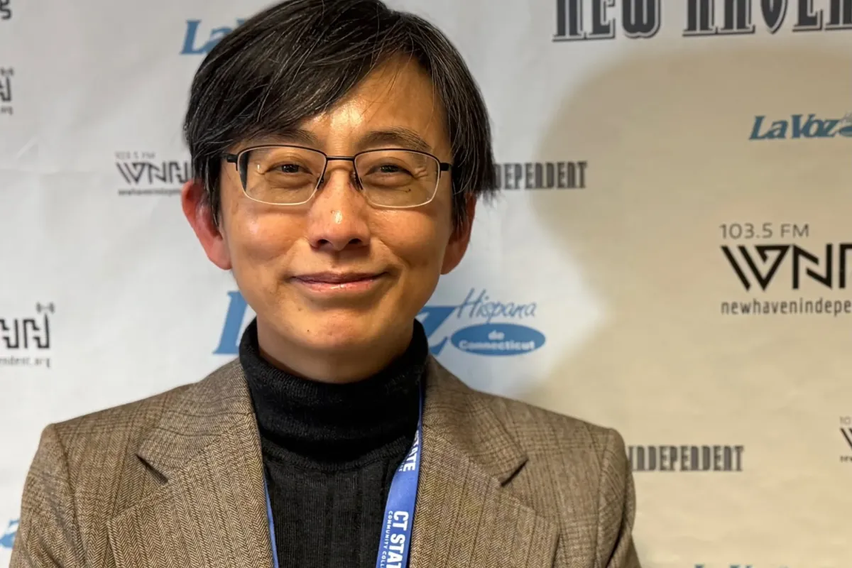 Sorry, Claude: Prez Wang (pictured at WNHH FM) has the job covered. Credit: Paul Bass Photo