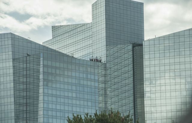 People standing at the top of Mohegan Sun tower.