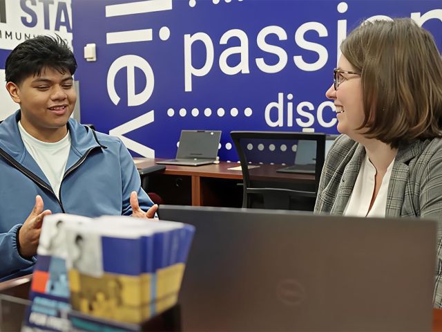 Students receive assistance with course registration and enrollment at Connecticut State Community College.