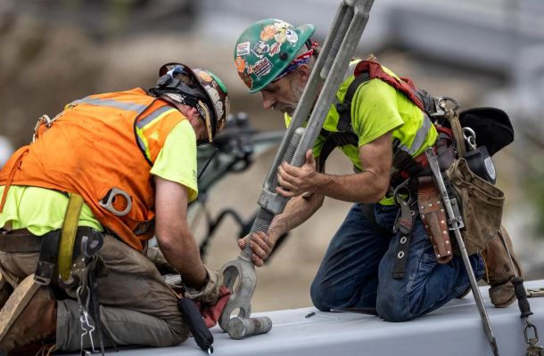 Group of workers collaborating at a job site
