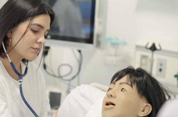 CT State Norwalk nursing students participate in hands-on clinical training in a simulation lab."