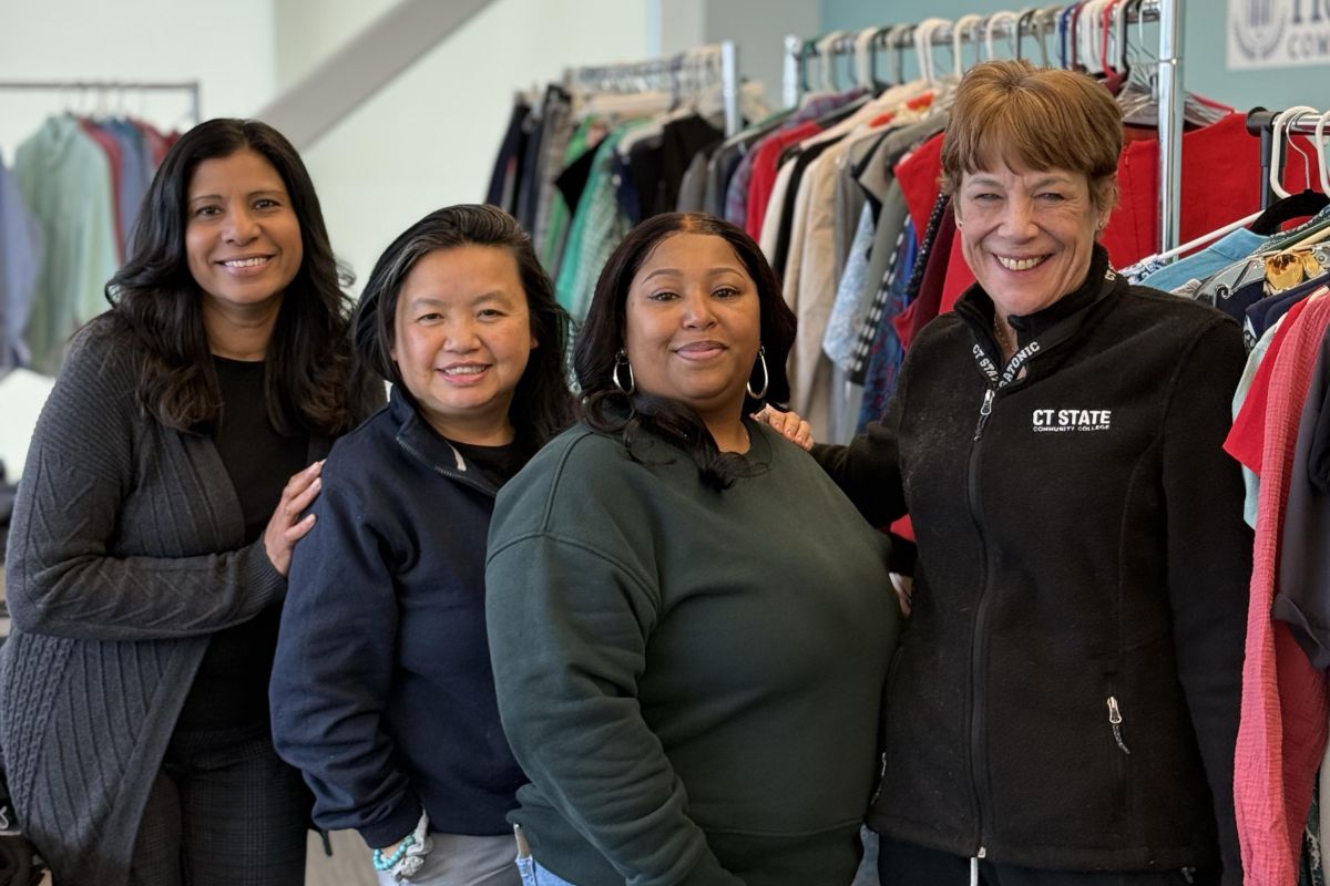 CT State students browse professional clothing on racks in the campus Career Closet, a program that provides free attire for interviews and workplace preparation.