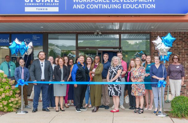 CT State Community College Interim President Christina Royal, CT State Tunxis Campus President Sharale Mathis, and CT State Tunxis Director of Workforce Development and Continuing Education Sue Passini pose with local and state officials, including Bristol Mayor Ellen Zoppo-Sassu and Reps. Joe Hoxha and Mary Fortier during the ribbon-cutting ceremony