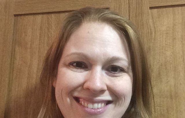 woman smiles into camera