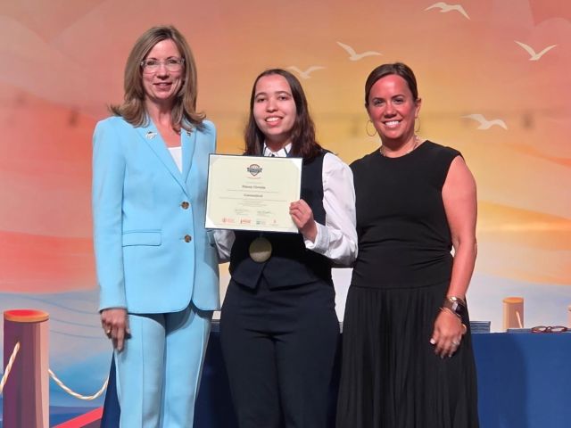 Chair of the Board of Phi Theta Kappa Dr. Monica Marlowe (l), and President of Coca-Cola Scholars Foundation, Jane Hale Hopkins, presented CT State Asnuntuck student Stacey Christie with a New Century Transfer Scholar award