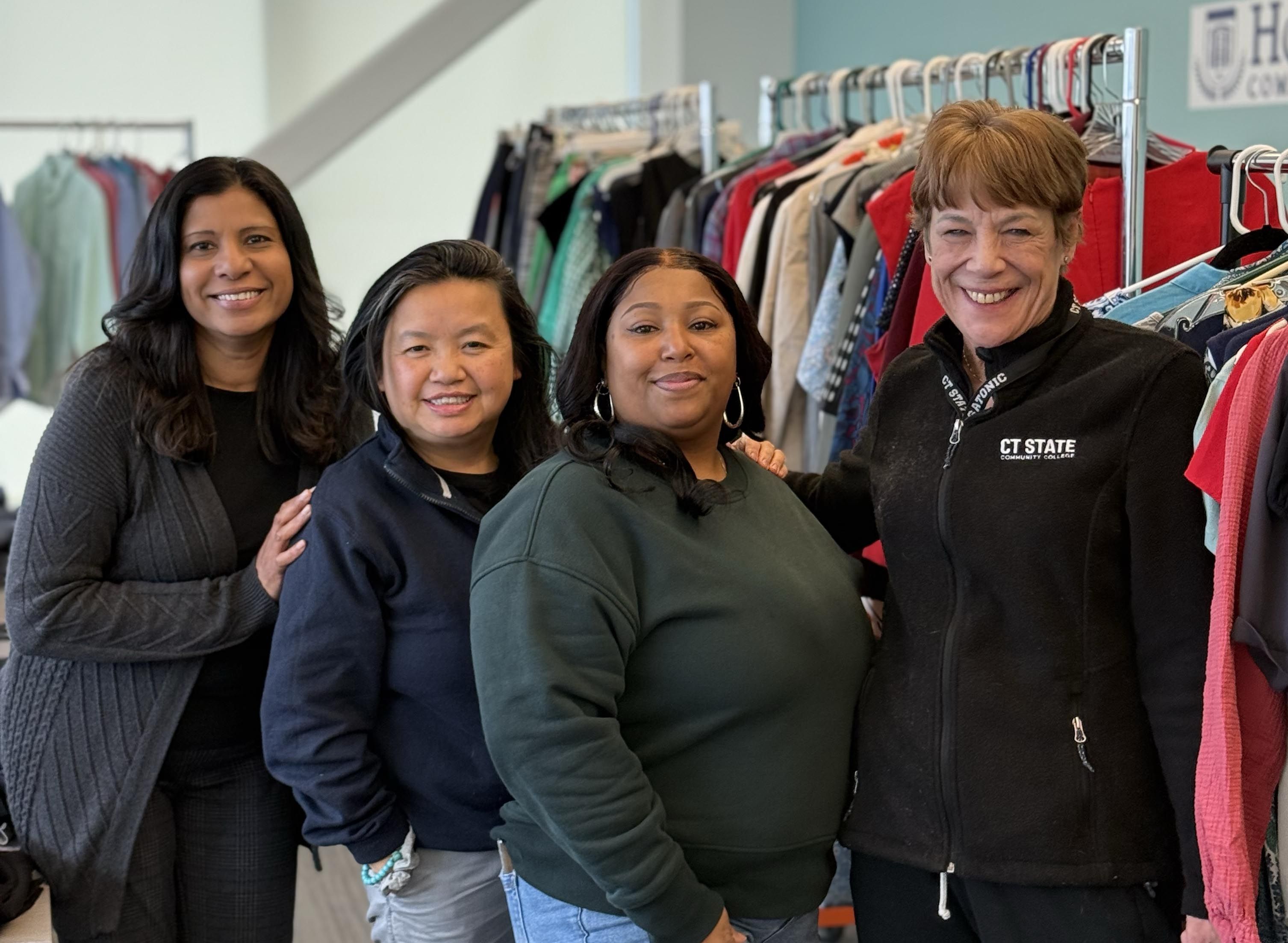 CT State students browse professional clothing on racks in the campus Career Closet, a program that provides free attire for interviews and workplace preparation.