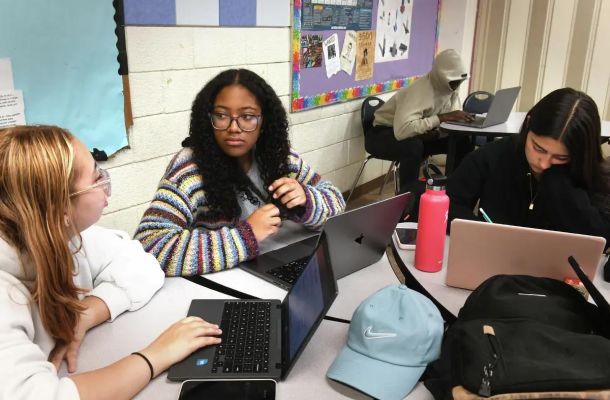 Amaya Smith, second from left, studies with her classmates during a class at P-TECH Norwalk High School, in Norwalk, Conn. Oct. 29, 2025.
