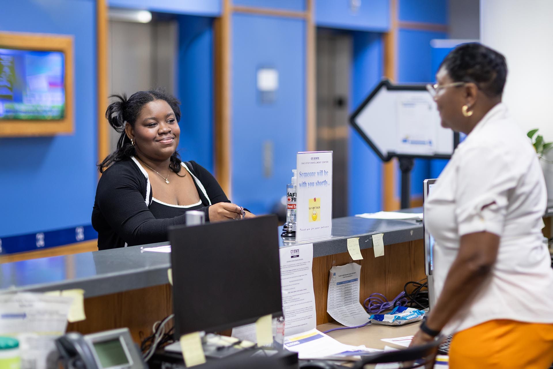 A student is registering for classes at CT State Capital.