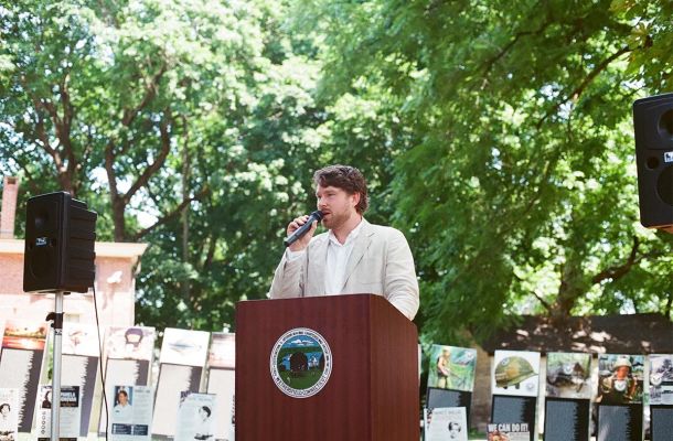 Poetry in Motion Evan Goldstein Speaking at Podium