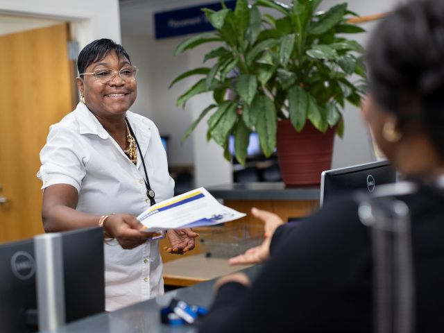 A student registers for classes at CT State Capital