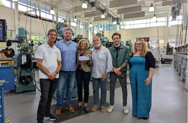 L-R: Director of AMTC Steve LaPointe, Donahue Industries President Kyle Wojcik, CT State CC Quinebaug Valley Director of Institutional Advancement Monique Wolanin, Donahue Industries VP of Operations Joe Draleau, Donahue Industries team members Scott Macleod and Jennifer Rudzinski